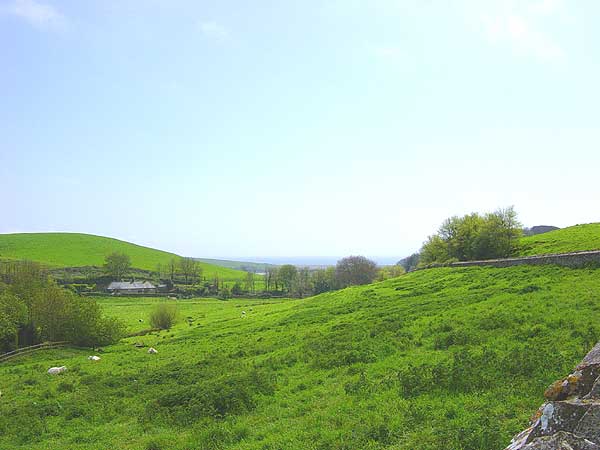 Abbotsbury - view from the bottom of Chapel Hill towards Abbotsbury Swannery, by Andrew Green